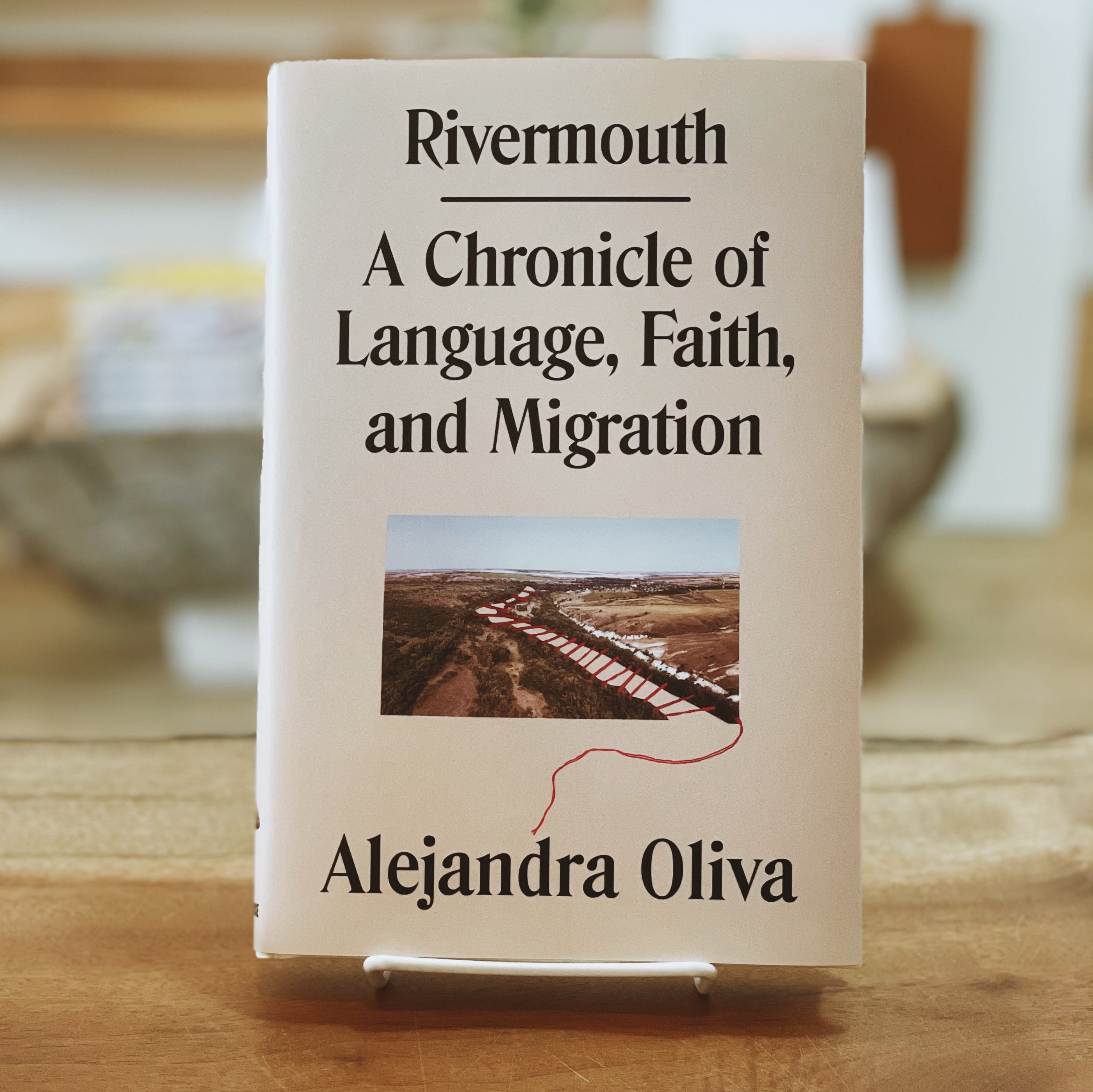 Rivermouth: A Chronicle of Language, Faith, and Migration